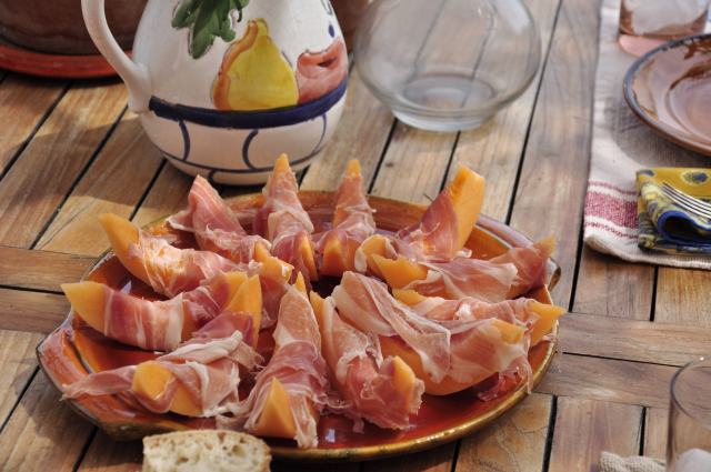 Wrapping fresh melons in prosciutto brings a sweet and salty combination together