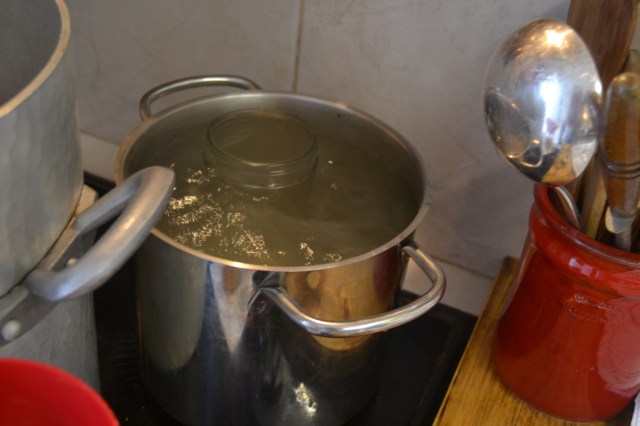 Step 5: boil canning jars and lids for at least 10 minutes to sterilize.